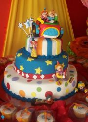 Four tier circus and clown theme cake.JPG