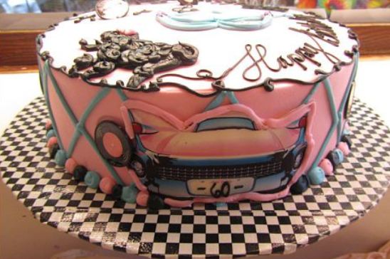 60ths theme pink birthday cake.JPG