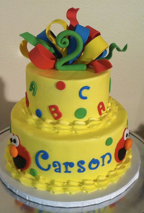 Two tier round yellow Elmo theme second birthday cake.JPG