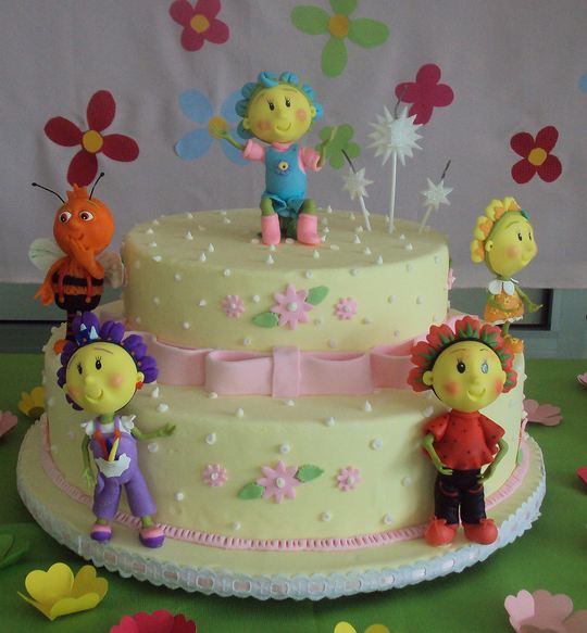 Two tier light yellow cake for kids.JPG