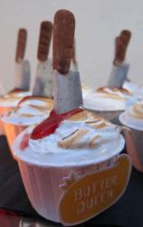Halloween stab theme cupcake with coconut and cream.JPG