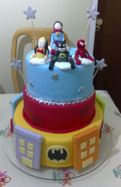 3 tier superhero theme birthday cake with batman, spiderman, superman and wonder woman.JPG