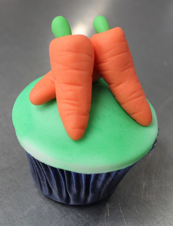 Cupcake with 3 mini-carrots on top.JPG