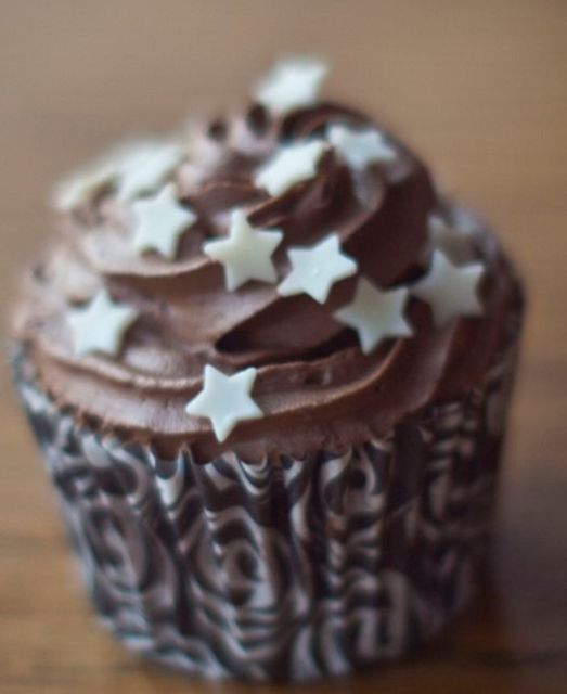 Chocolate cream cup cake with white stars.JPG