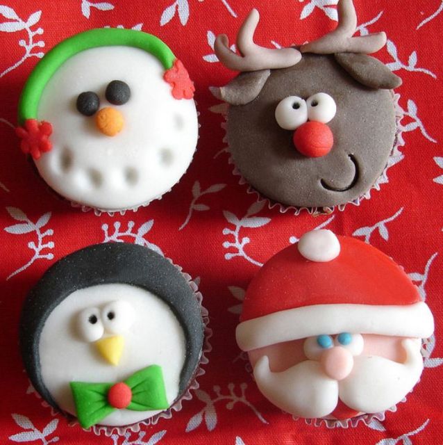 Christmas theme cupcakes in Snowman, Reindeer, Penguin and Santa face.JPG