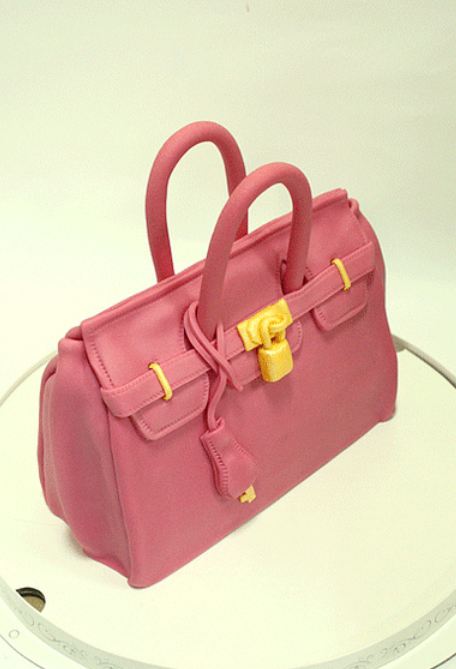 Pink handbag cake with gold lock.JPG