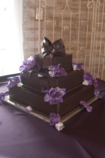 3 tier Chocolate Cake with purple flowers.jpg