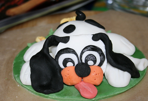 Puppy 1st birthday cake pictures.PNG