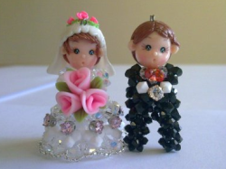Unique wedding cake topper looking so cute and pretty.PNG