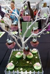 Spring theme Cupcakes hanging from Tree.JPG