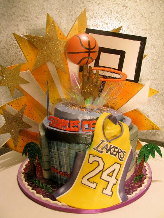 Los Angeles Laker theme cake with jersey and Staples Center.JPG