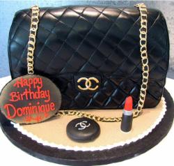 Black Chanel handbag cake with lipstick.JPG