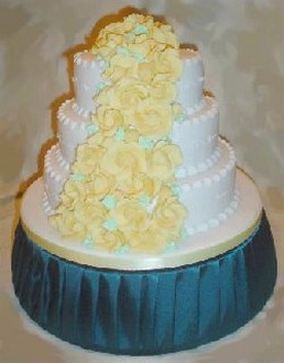 pic of wedding cake with yellow florals