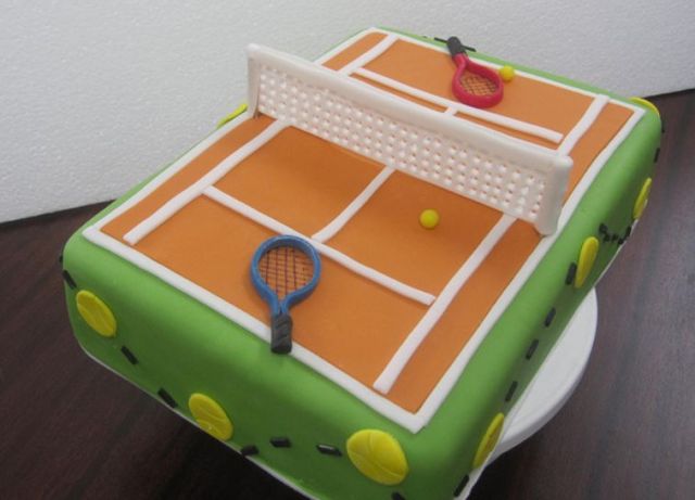 Green tennis cake with orange court.JPG
