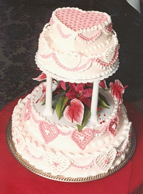 heart wedding cake in pink and white