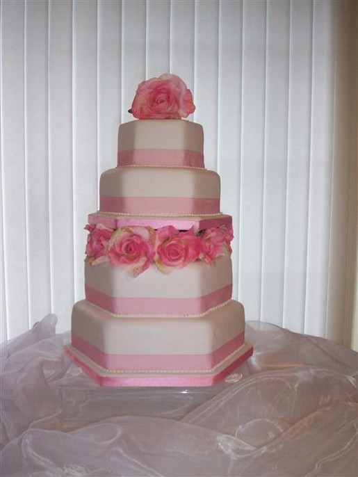 Wedding cake with silk roses.jpg