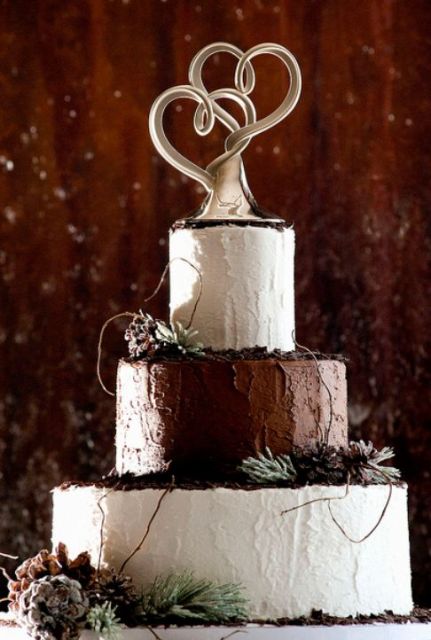 3 tier round wedding cake with modern dual heart sculpture topper.JPG