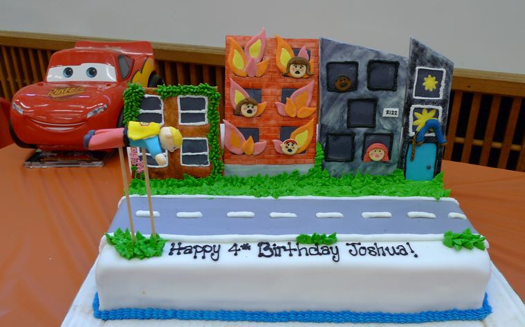 4th birthday cake for boy of a flying hero.JPG