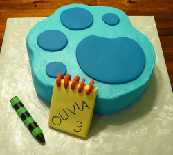 Blue's Clues paw print cake with Handy Dandy note book with crayon.PNG
