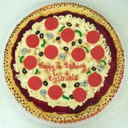 Pizza birthday cake with pepperoni olives and mushrooms.jpg