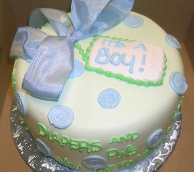 It's a Boy white cream baby shower cake with blue ribbon.JPG