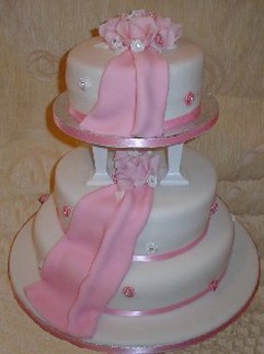 Baby pink wedding cake photo