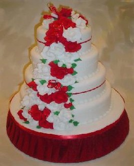 wedding cake with red rose cascade