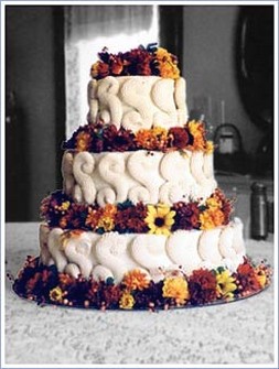 image of wedding cake with colorful flowers