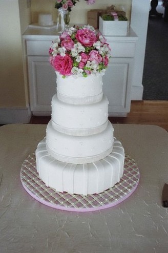 peonies and hydrangea wedding cake