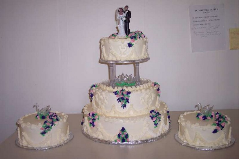 white with Purple Trio Cake