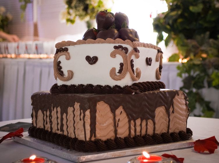 Elegant groom's cake with chocolate covered strawberries.JPG