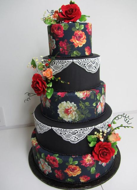 Five tier black round wedding cake with red roses.JPG