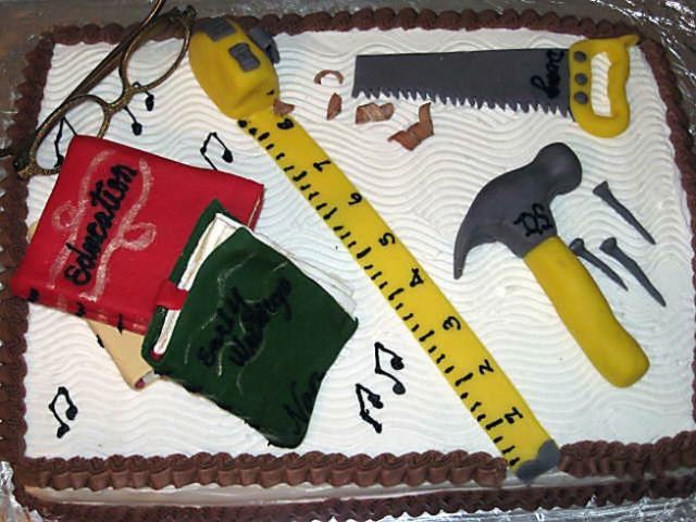 books and handyman retirement cake.jpg