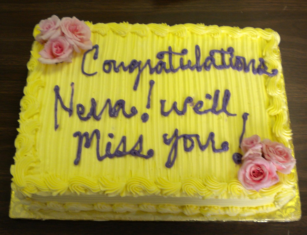 Bright yellow Retirement cake photos.jpg